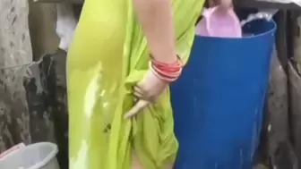 Young water cleaner alluring aunty in village house