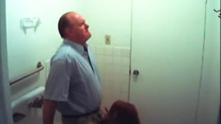 Bathroom lady swallows cock in restroom